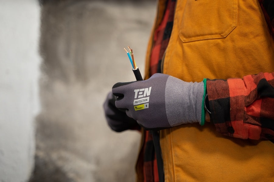 Electrical Contractor in Hutchinson Island Florida Close Up of an Electrician Hands with Gloves On