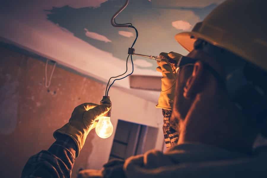 Electrical Contractor in Jupiter Florida Close Up of a Contractor Working on a Light Installation
