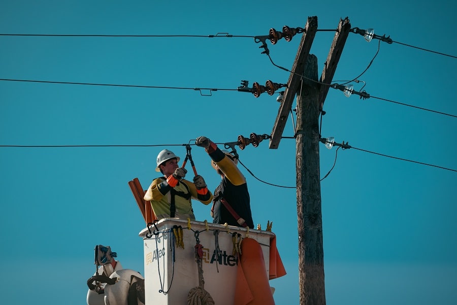Electrical Contractor in Sewall's Point Florida Two Electricians Working on a Power Line