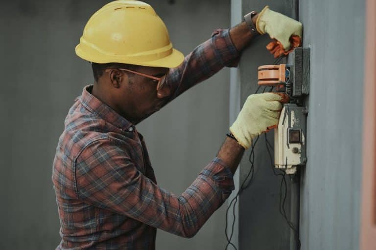 Best Electrical Contractor in Port St. Lucie, Florida an Electrician Working on an Installation
