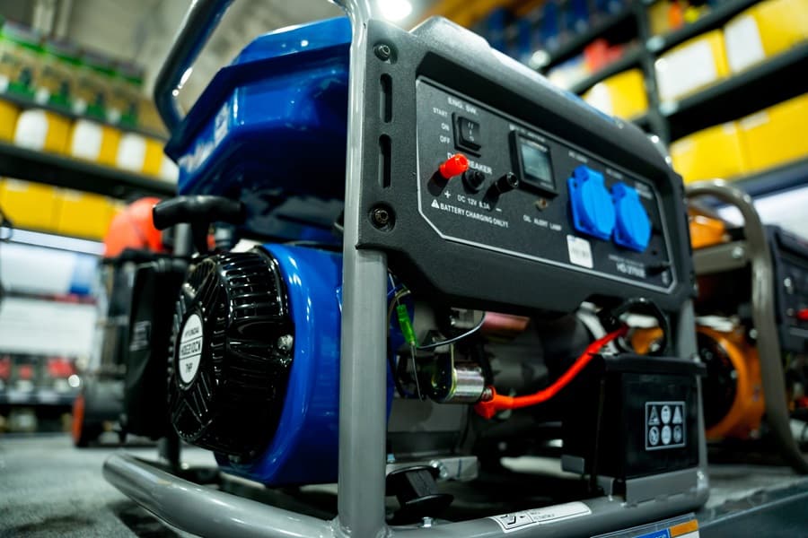 Why Should I Buy a Generator Close Up of a Portable Generator in a Warehouse