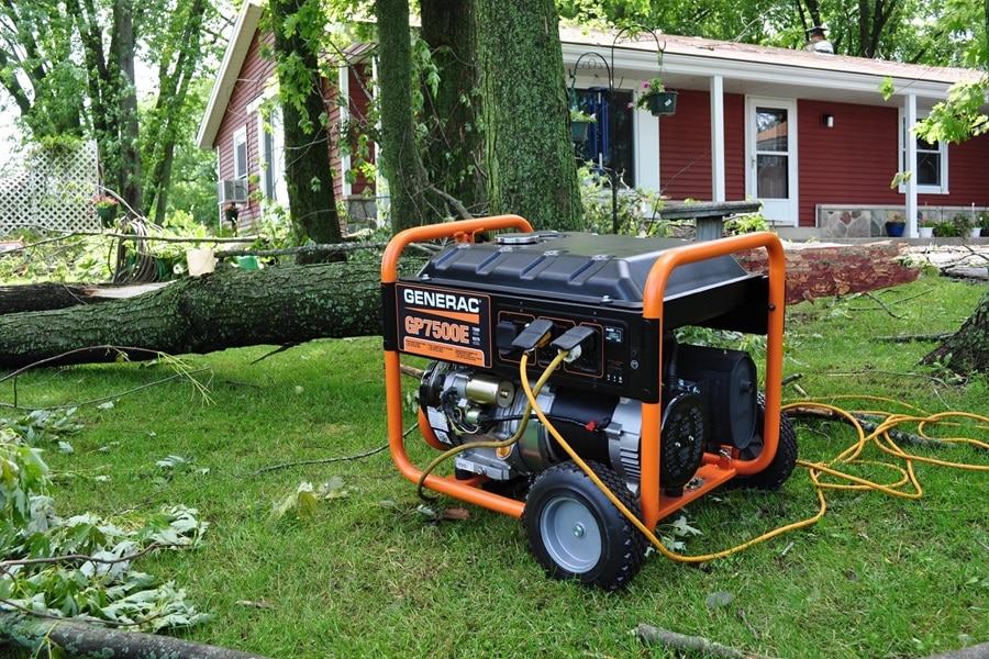 Martin County Generac Service Provider Electrician Portable Generac Generator Sitting in a Yard of a Home