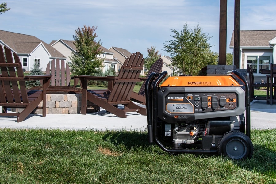 Martin County Generac Service Provider Electrician a Portable Generac Generator in a Yard with Lawn Chairs