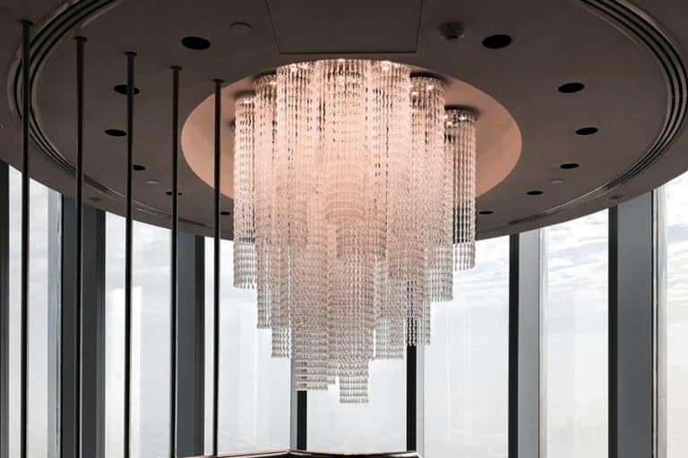 What is the Best Light Temperature for a Crystal Chandelier in Florida Close Up of a Crystal Chandelier Hanging in a Lobby of a Business