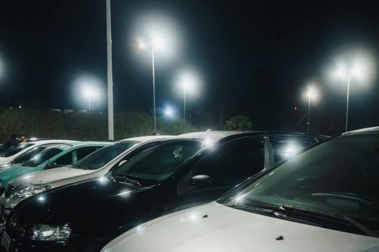 Best Parking Lot Light Electrical Contractor in West Palm Beach Close Up of Cars in a Row Under Parking Lot Lighting