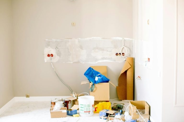 Best Home Remodel Electrician in Greenacres a Room with Bare Drywall and a Pile of Tools in One Corner