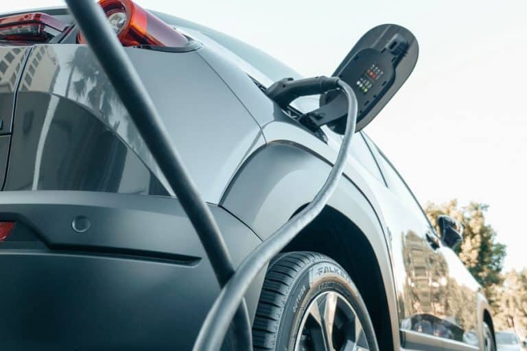 Best EV Charger Installation Electrician in Boca Raton an EV Charging Outdoors