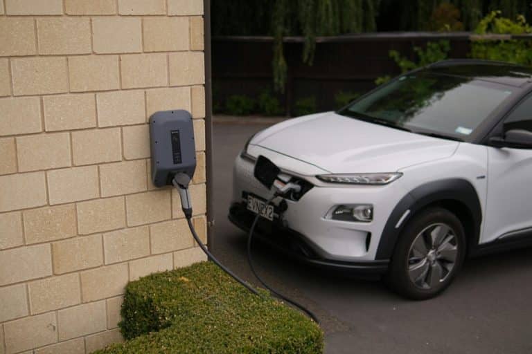 Best EV Charger Installation Electrician in Loxahatchee The Acreage an EV Charging in a Driveway
