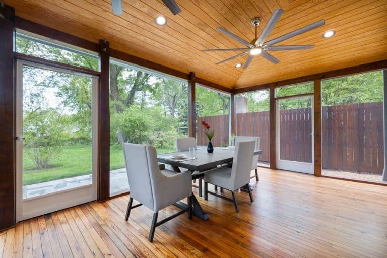 Best Ceiling Fan Installation Electrician in Manalapan a Ceiling Fan Above a Table in a Covered Patio