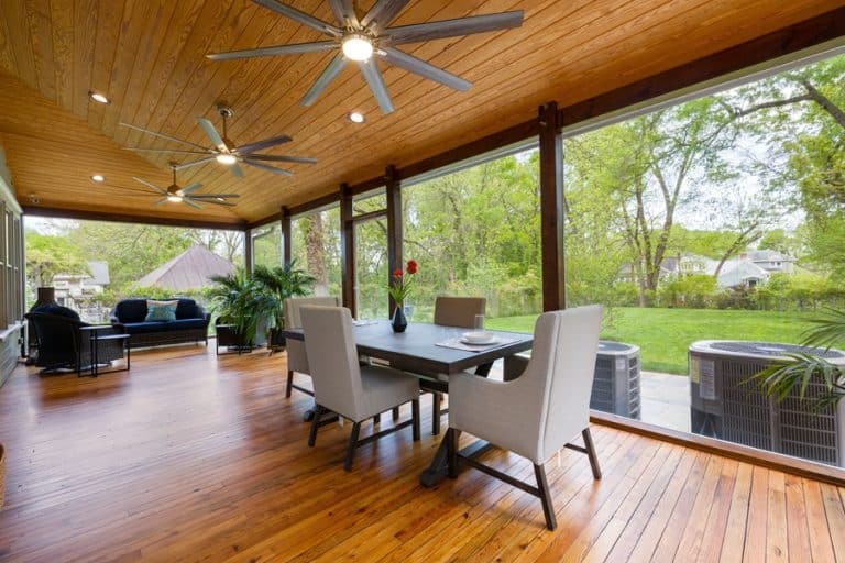 Best Ceiling Fan Installation Electrician in Palm Beach Gardens Ceiling Fans in a Covered Outdoor Patio with Tables and Chairs