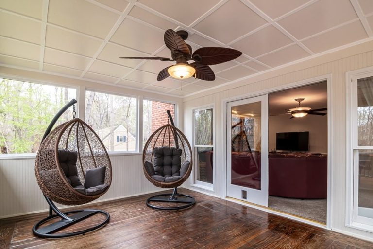 Best Ceiling Fan Installation Electrician in Palm Beach a Ceiling Fan in a Florida Room with Two Hanging Chairs
