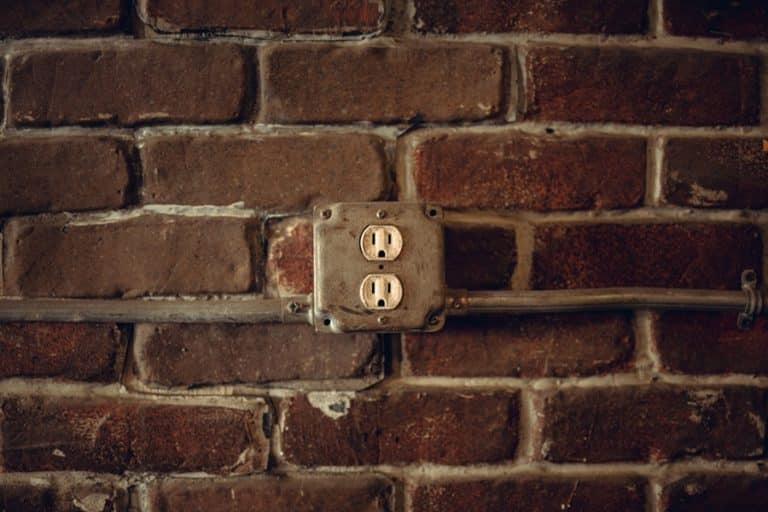 Best Electrical Contractor in Loxahatchee The Acreage an Outlet Box on a Brick Wall